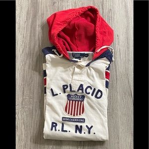 Polo Ralph Lauren hooded rugby with thermal lined hood and chenille patch work.
